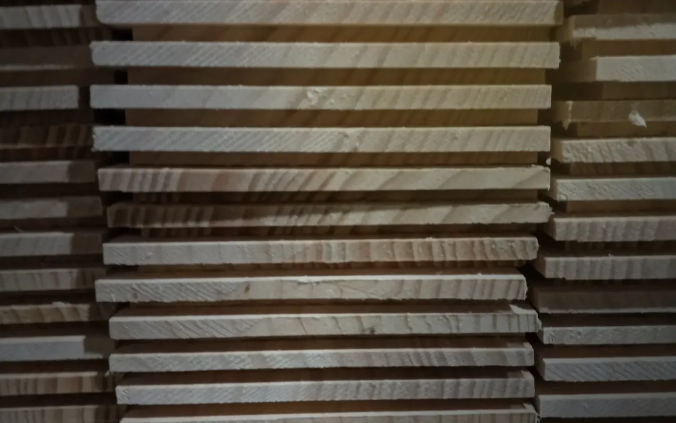 Stacks of accurately cut timber components for repeatable beehive box building